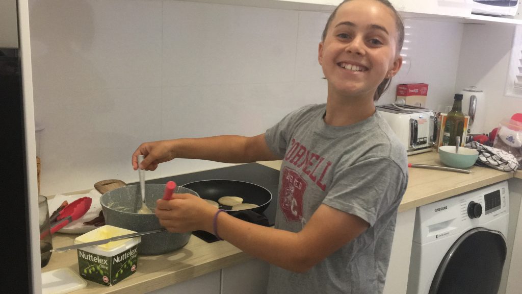 Katie cooks pancakes